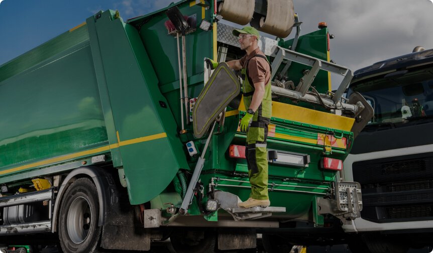 Caucasian modern garbage truck worker and the vehi 2023 11 27 05 19 37 utc 1 2
